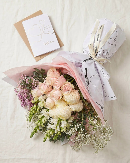 Osaka Signature bouquet with a greeting card, studio flat lay