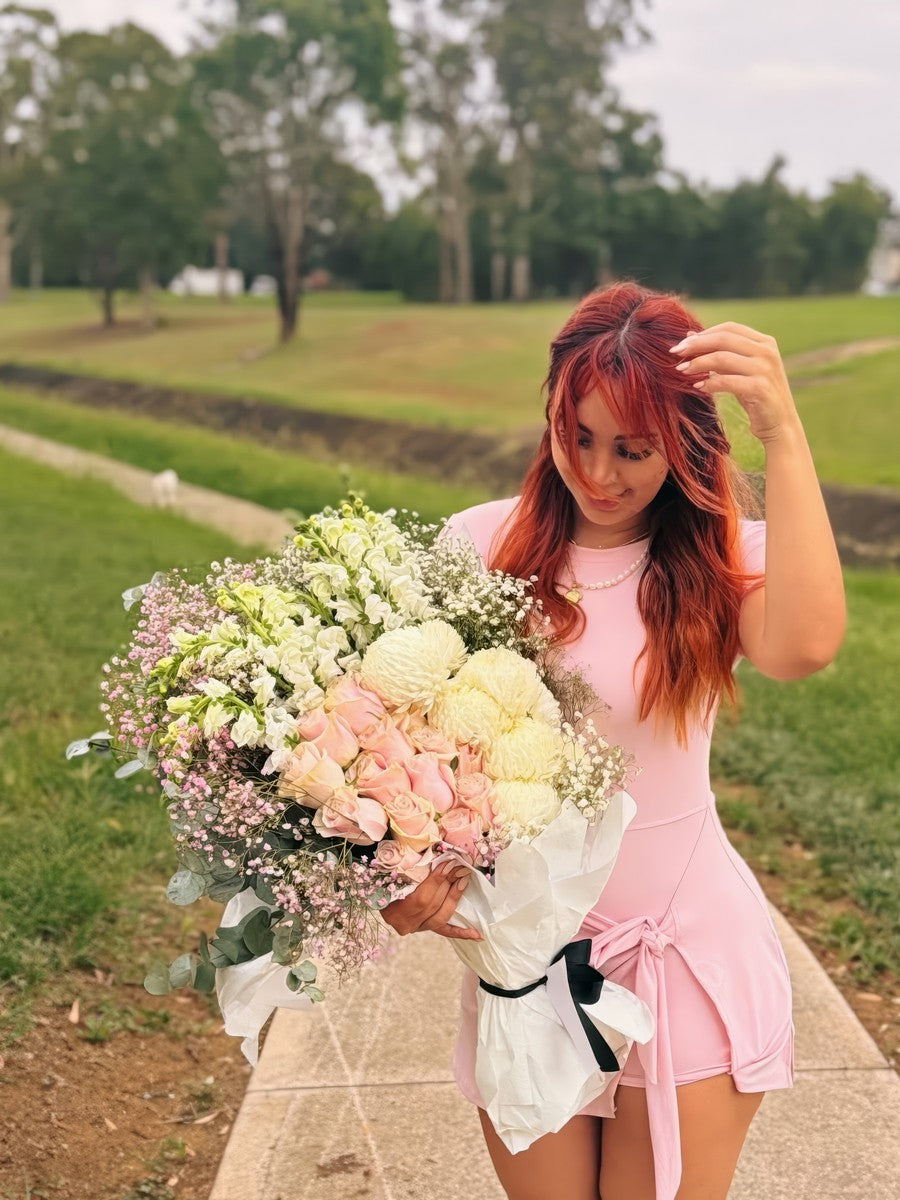 Fig & Bloom customer bouquet