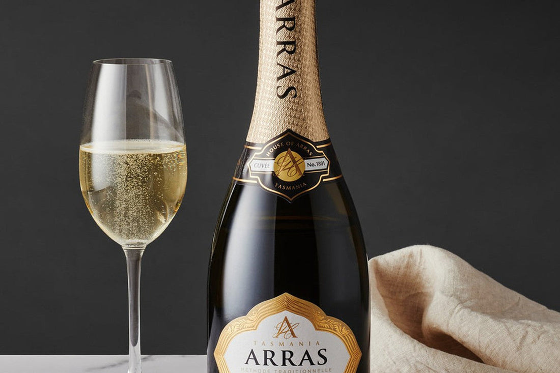 House of Arras Brut Elite, Cuvee No. 1801, beside a filled glass