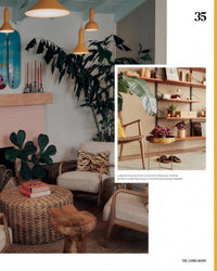 Inside Plant House: living room layered with greenery and rattan seating