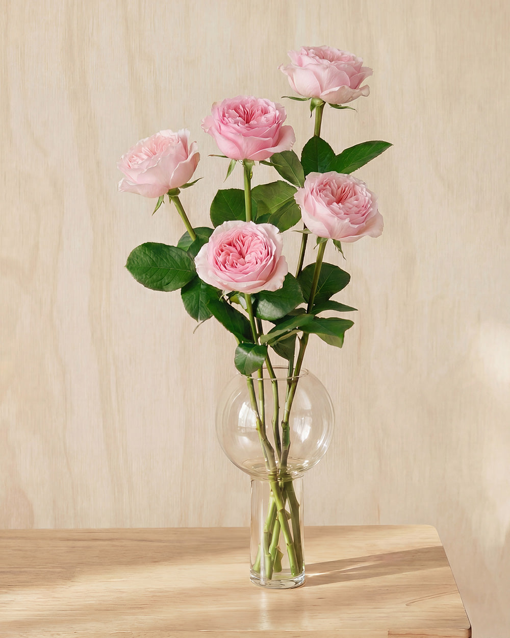 Pink Roses in Balloon Glass Vase