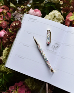 Typoflora Blooms in White rollerball pen