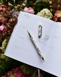 Typoflora Blooms in White rollerball pen