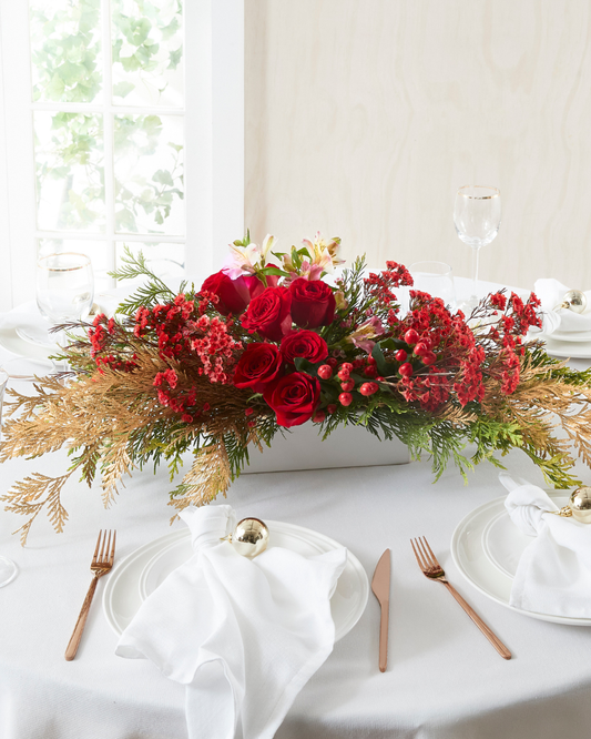 red and gold Christmas table centrepiece 