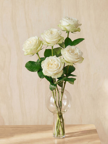 White Roses in Balloon Glass Vase