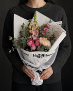 Positano Posy by Fig & Bloom held in front at chest height
