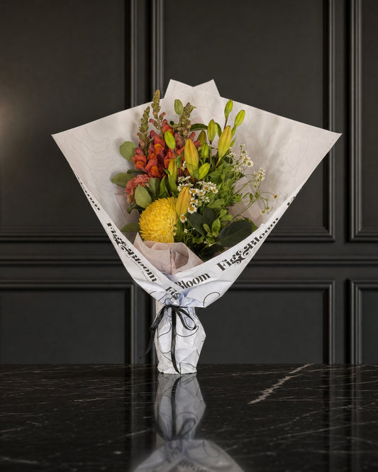 Amalfi Posy by Fig & Bloom standing on black marble