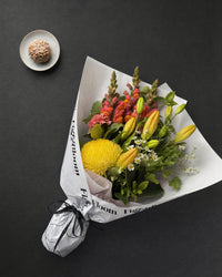 Amalfi Posy by Fig & Bloom, flat lay on charcoal slate