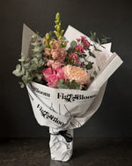 Positano Posy by Fig & Bloom: pink roses, snapdragon and waxflower, hand-tied in printed paper