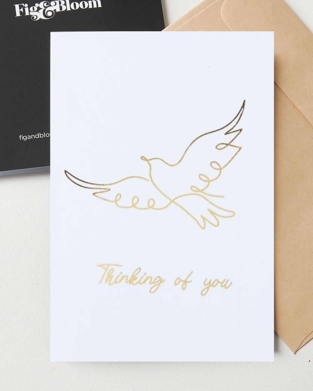 Thinking of You greeting card by Fig & Bloom, gold foil dove line illustration with envelope