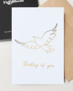 Thinking of You greeting card by Fig & Bloom, gold foil dove line illustration with envelope