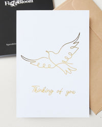 Thinking of You greeting card by Fig & Bloom, gold foil dove line illustration with envelope