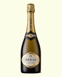 House of Arras Brut Elite, 750mL bottle of Tasmanian sparkling wine, centred on a plain butter-cream background.