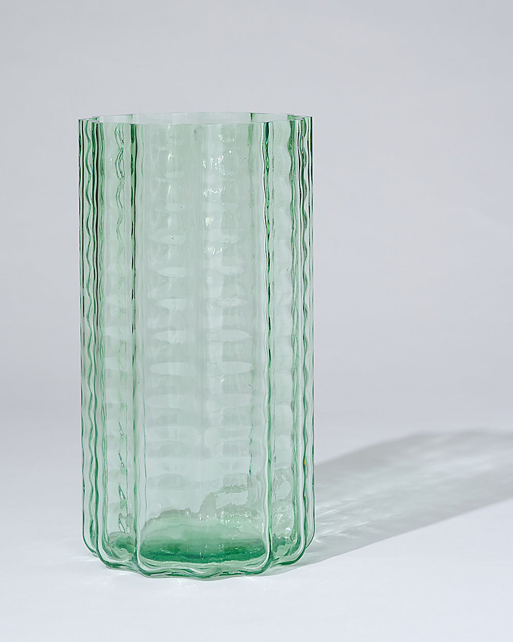 Green mouth-blown Jelly Glass Vase with a scalloped rippled profile, 28cm