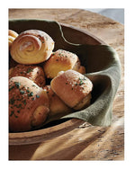 Truffle butter rolls in a wooden bowl, from Magnolia Table Volume 3