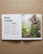 Martha Stewart's Gardening Handbook open at the Rose Garden chapter