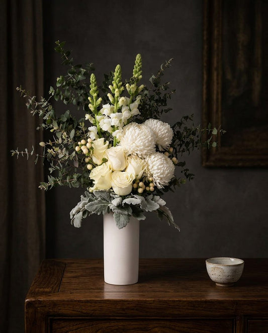 Lucerne arrangement styled on a dark timber sideboard