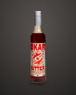 Økar Bitter Aperitivo 700mL by Applewood Distillery, on a charcoal studio sweep