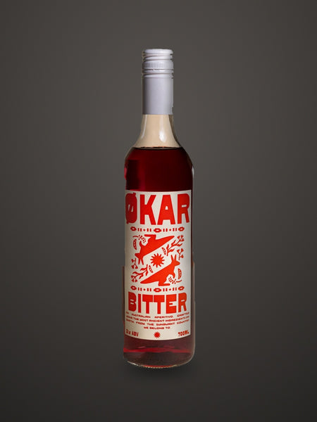 Økar Bitter Aperitivo 700mL by Applewood Distillery, on a charcoal studio sweep