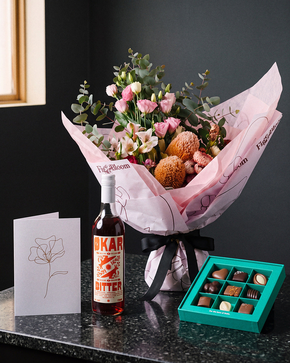 The Aperitif gift set: Broome bouquet in Gesture size with Okar Bitter, Koko Black chocolates and the Single Stem greeting card
