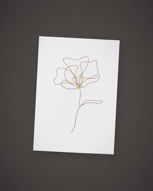 The Single Stem greeting card, gold line art on white, included in The Fuss.