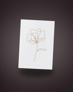 The greeting card, gold line art on white, handwritten by our florists and included in The Lot.