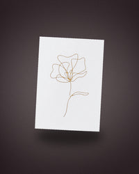 The greeting card, gold line art on white, handwritten by our florists and included in The Lot.
