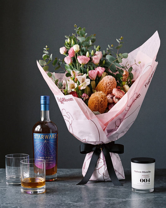 The Nightcap gift set: Broome bouquet in Gesture size with Starward Two-Fold whisky, tumblers and a Maison Blanche candle