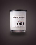 Maison Blanche 004 Bergamot & Tobacco candle, the 15 hour petite candle included in The Nightcap.