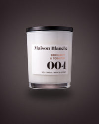 Maison Blanche 004 Bergamot & Tobacco candle, the 15 hour petite candle included in The Nightcap.